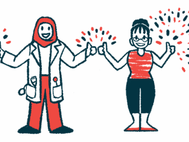 Fireworks explode around the hands of a doctor and patient standing side by side and each giving a double thumbs-up sign.