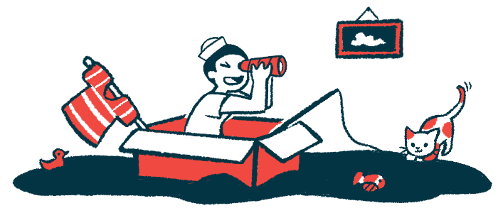 A boy in a sailor hat sits in a cardboard box with a fishing pole and a spyglass.