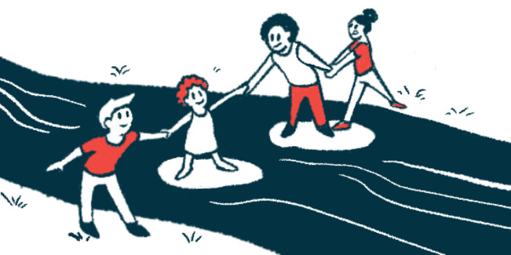 Four children hold hands to form a chain as they use steppingstones to cross a stream.