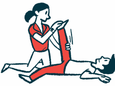 A person in red pants has their leg stretched by a physical therapist.