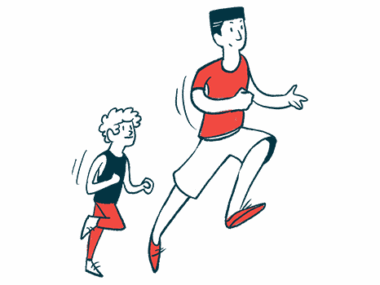 An adult and a child in exercise clothes run together.